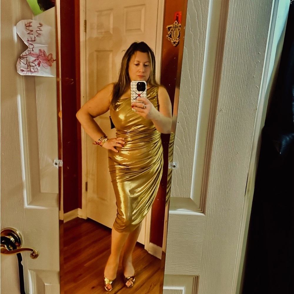New with tag Norma Kamali One Shoulder Sunburst Gown in gold